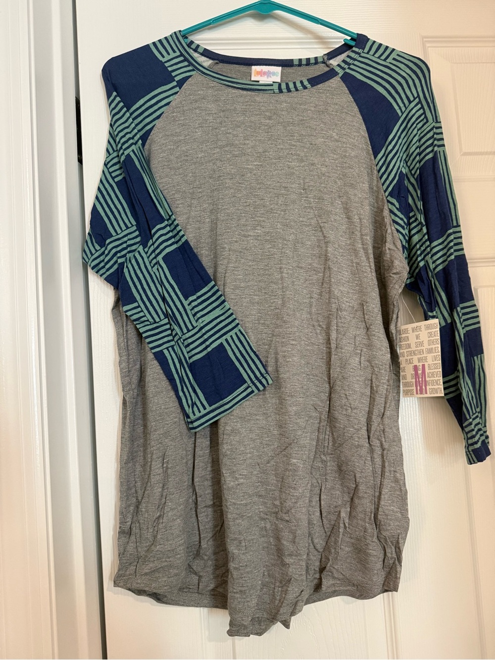 LuLaRoe Randy Gray Raglan Tee with Navy and Teal Patterned Sleeves